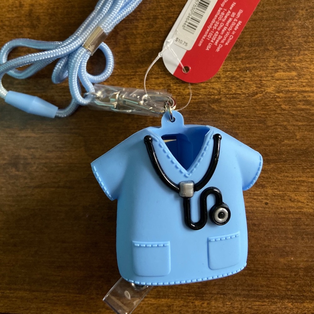 Nurse badge reel / lanyard and sanitizer holder